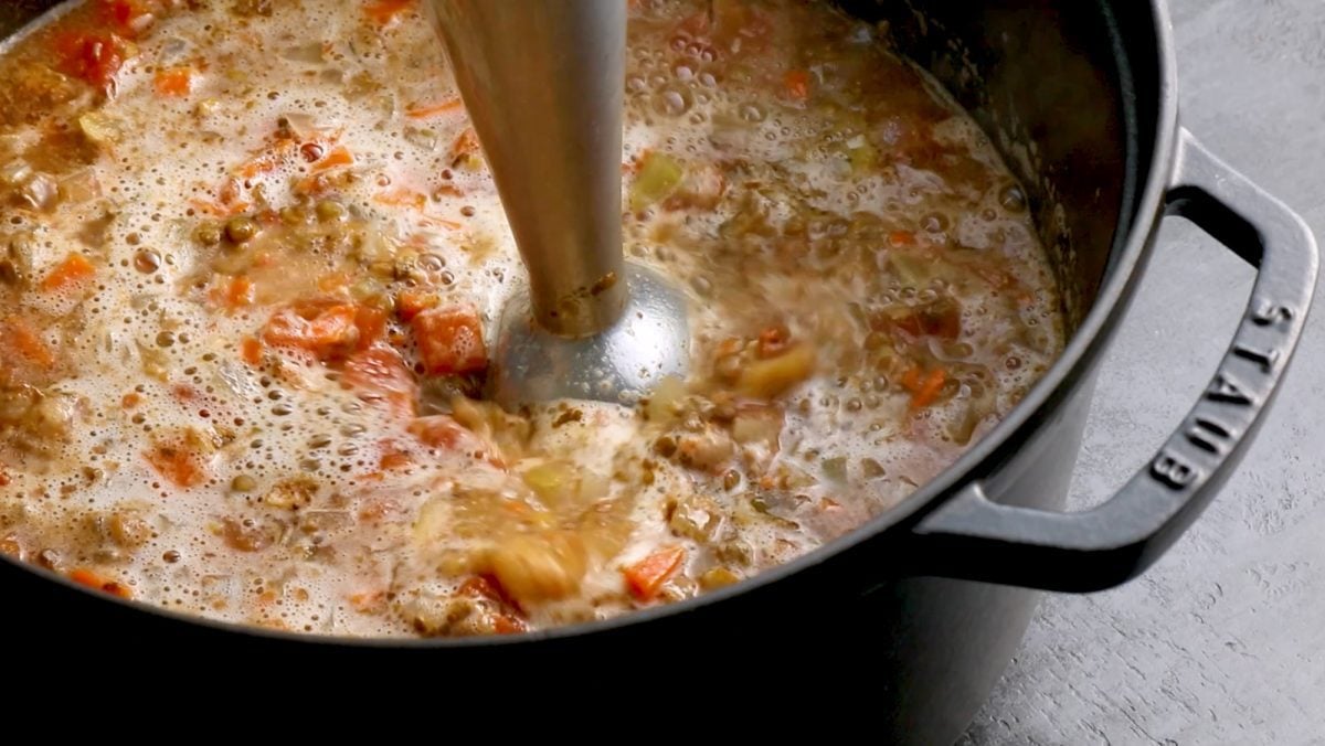 blending lentil soup with immersion blender.