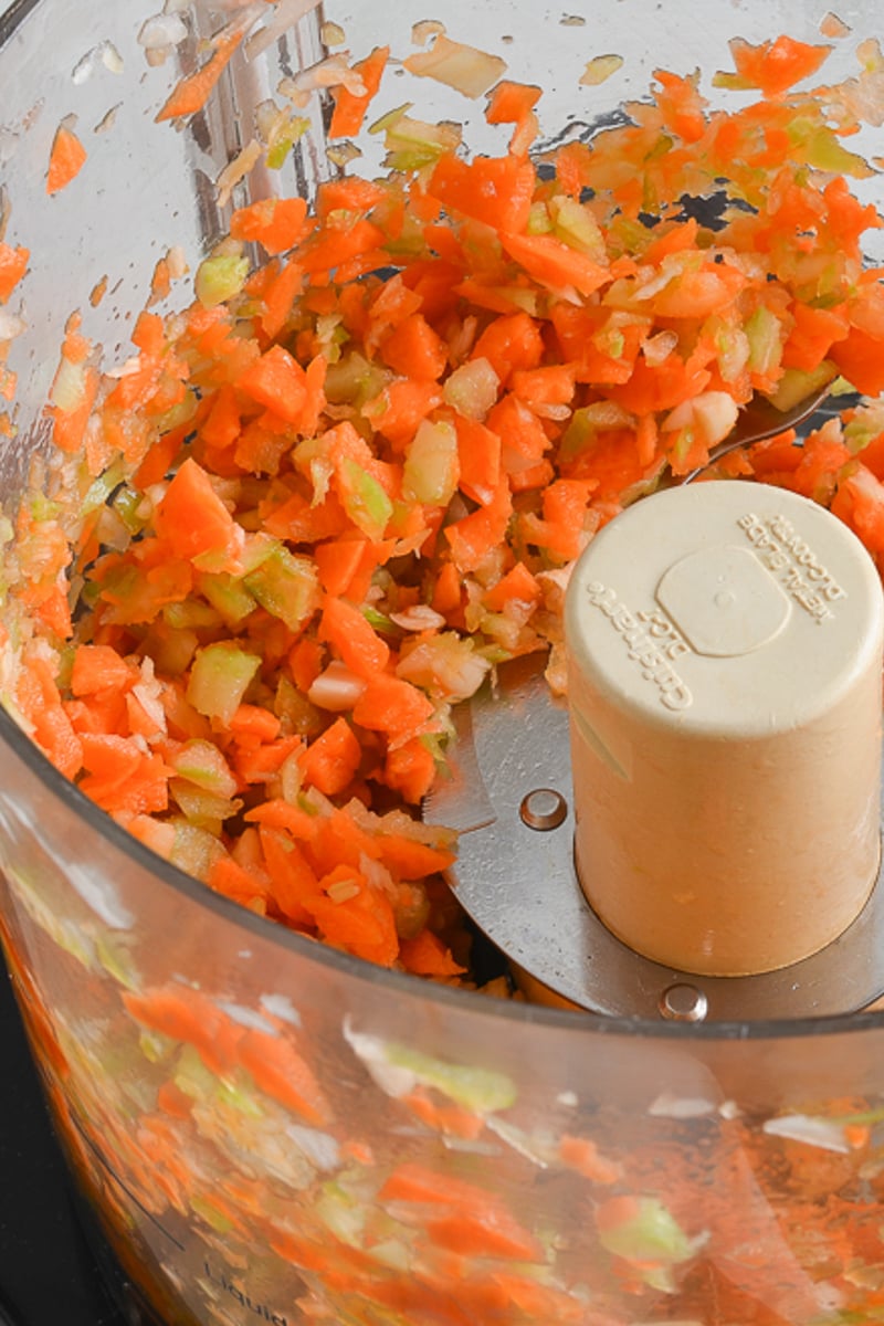 chopped carrots, celery, and garlic in food processor