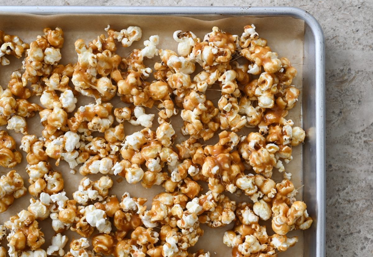 caramel corn on baking sheet