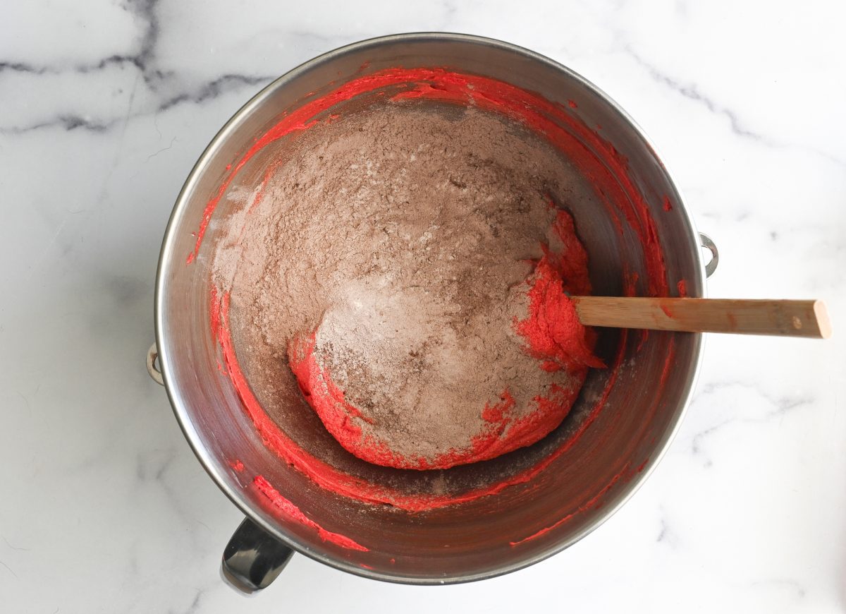 adding dry ingredients to batter.