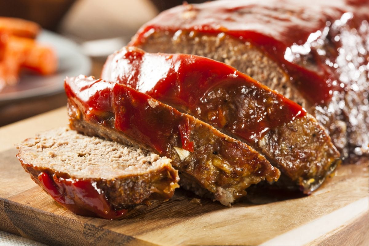sliced meatloaf on cutting board