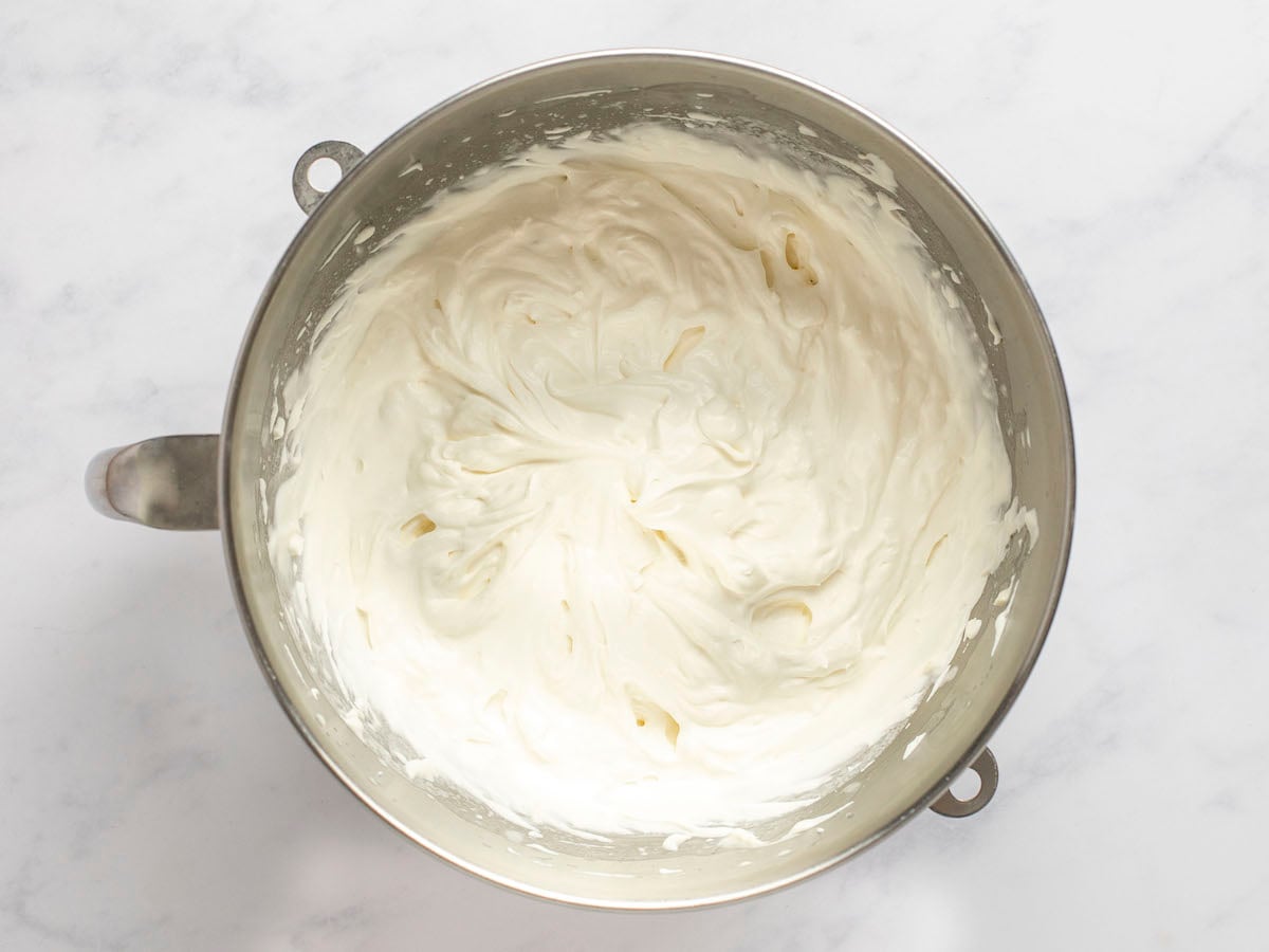 Mascarpone cheese, heavy cream, sugar, vanilla, and lemon zest whisked into medium-stiff peaks.