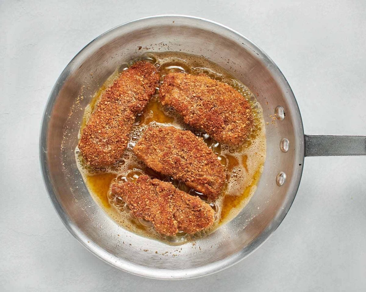 frying the pecan crusted chicken tenders.