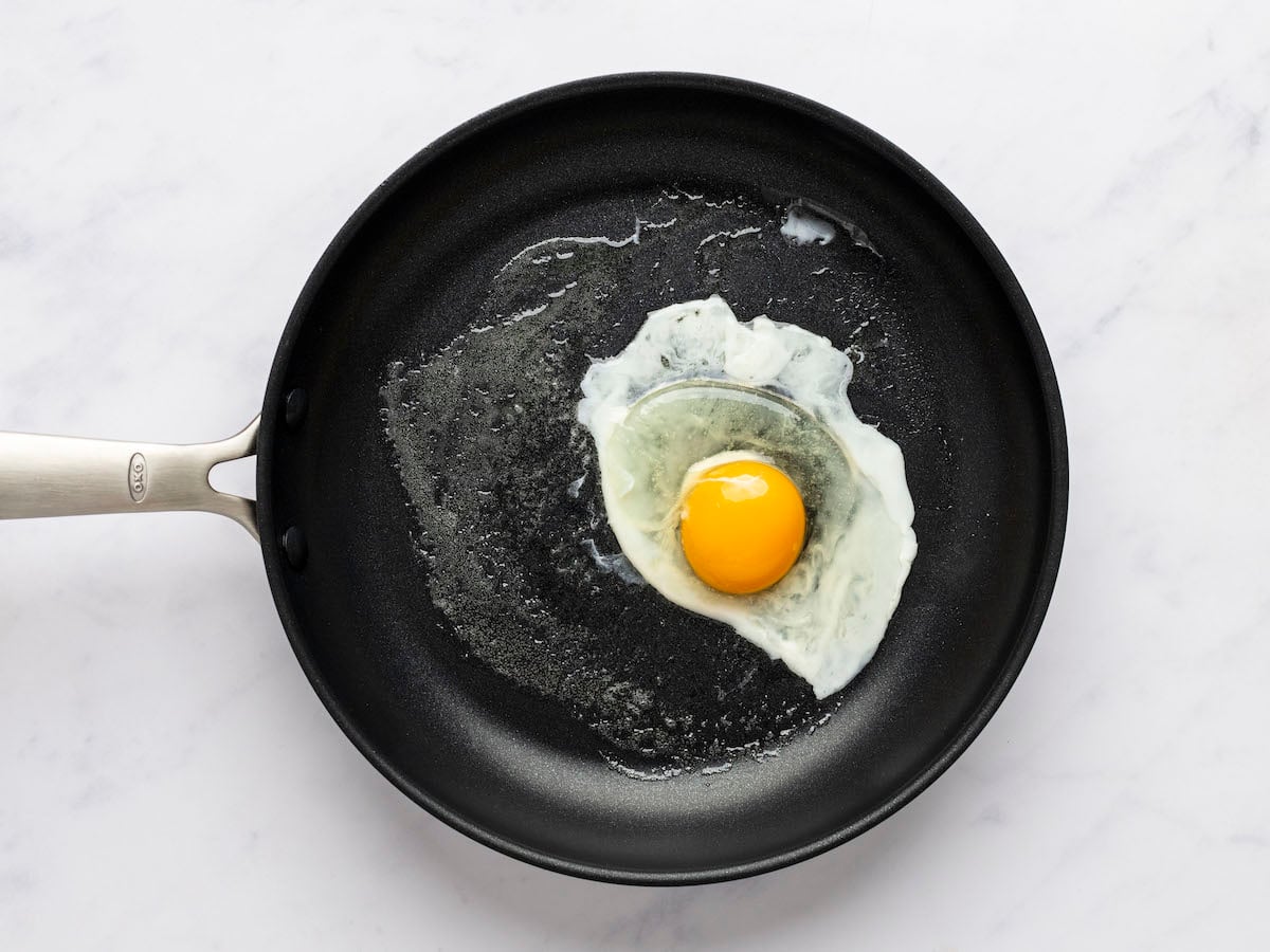 egg starting to cook in medium non-stick pan