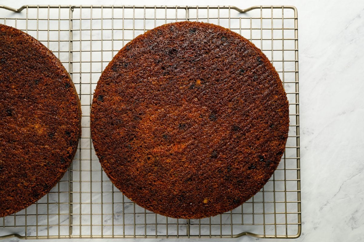 carrot cake layers cooling on rack