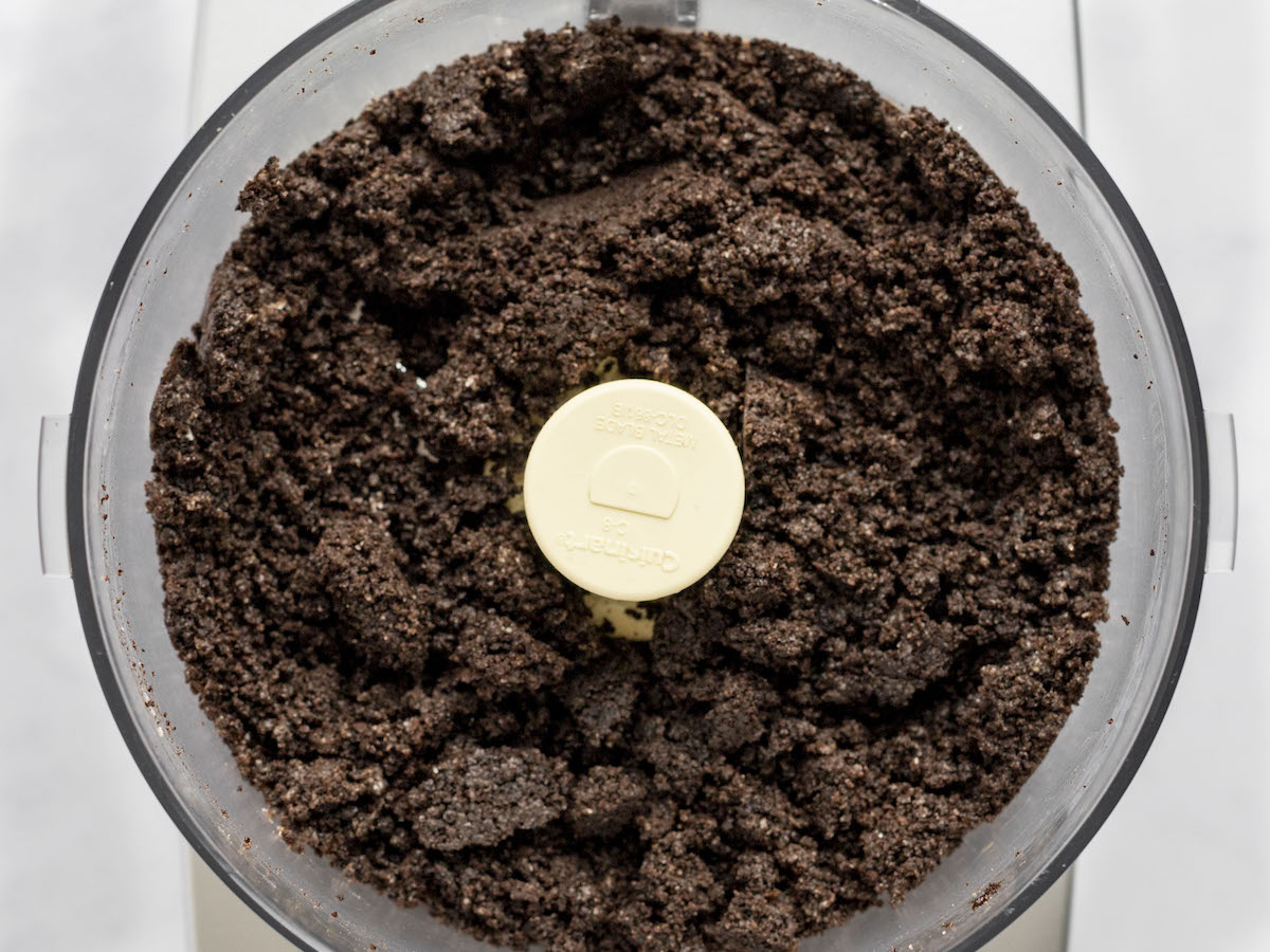 finely chopped oreos and butter combined in food processor