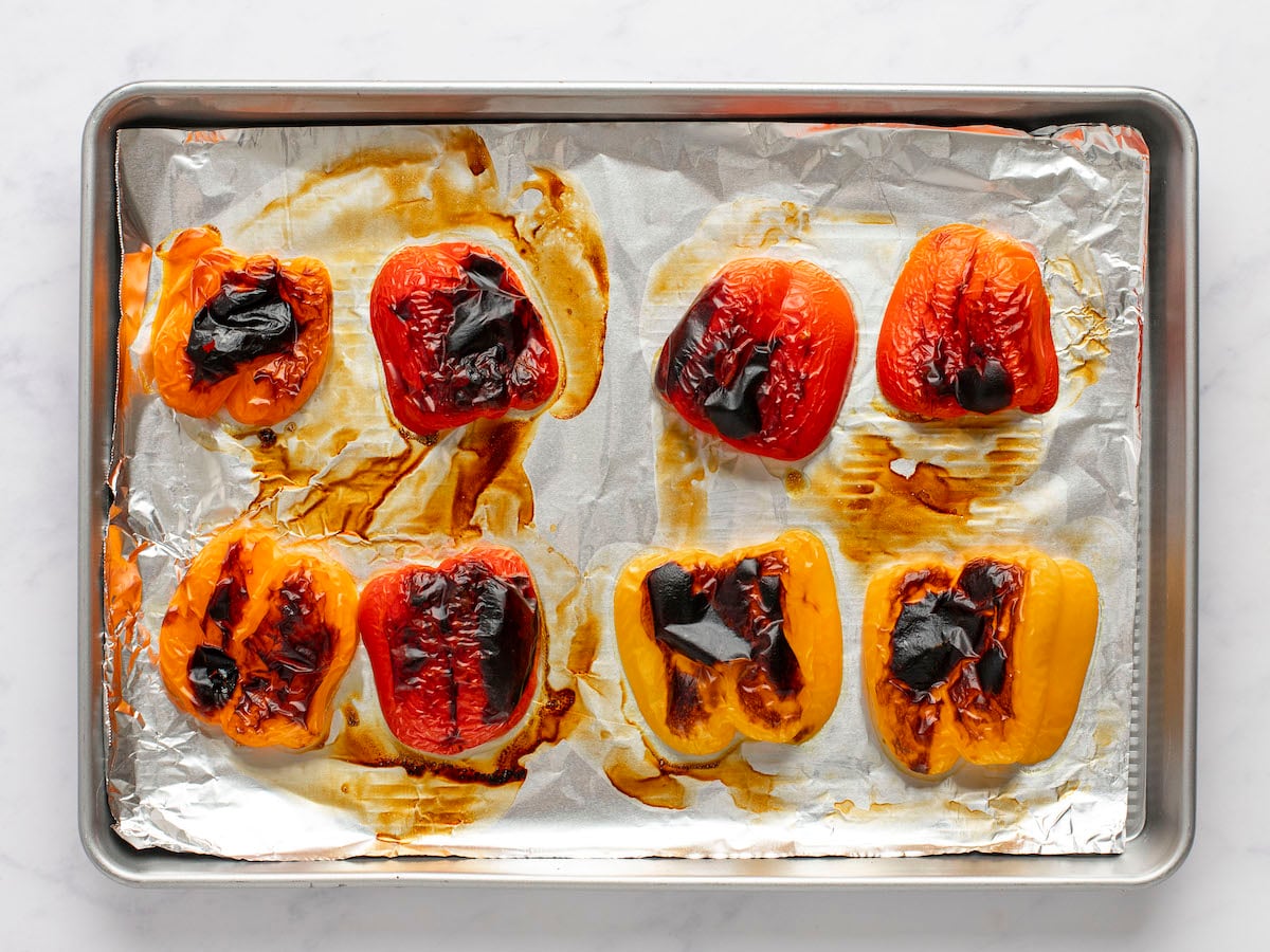 roasted peppers on foil-lined baking sheet.