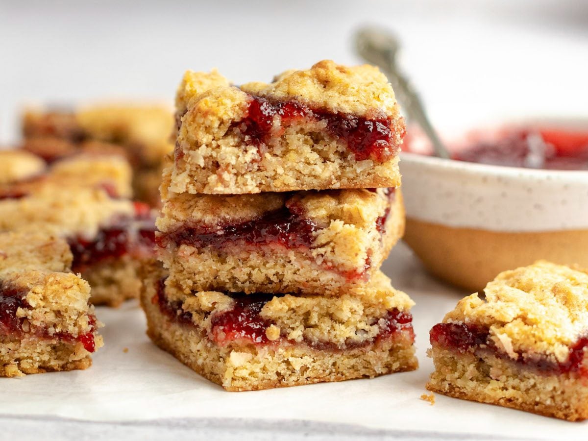 jam bars cut and stacked on marble.
