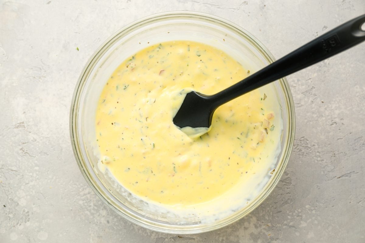sauce in glass bowl with remaining tarragon and shallot reduction mixed in