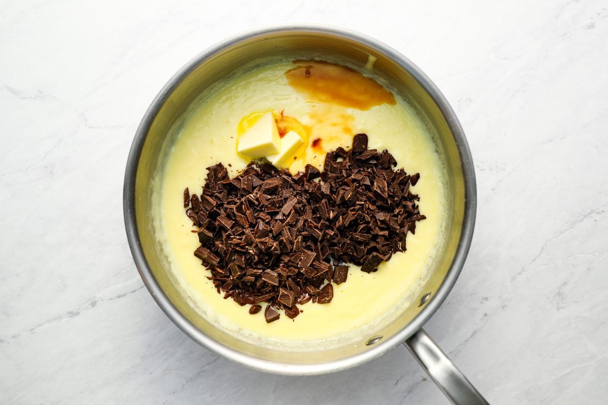 chopped chocolate, butter, and vanilla extract added to saucepan