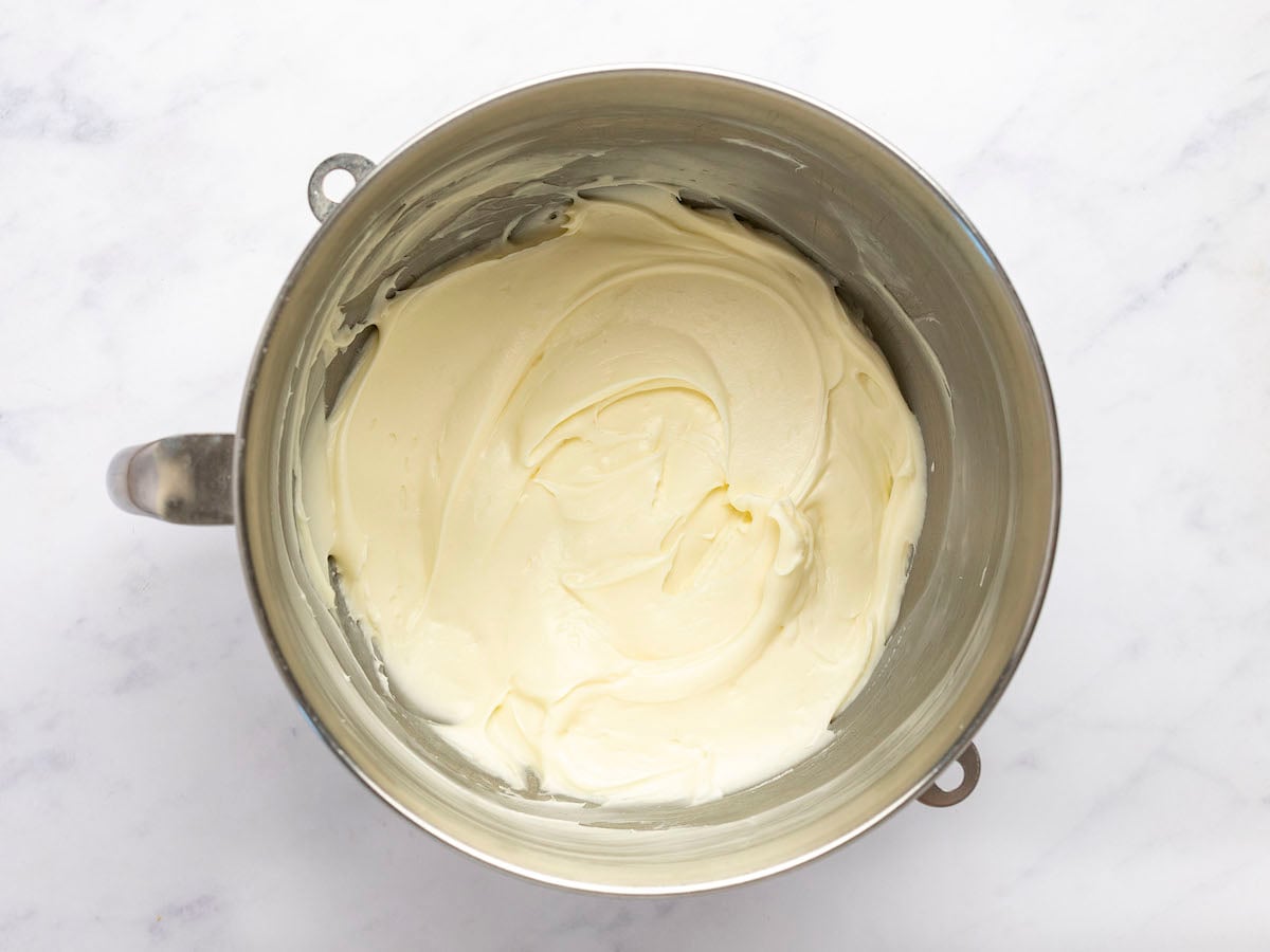 whipped frosting in mixing bowl