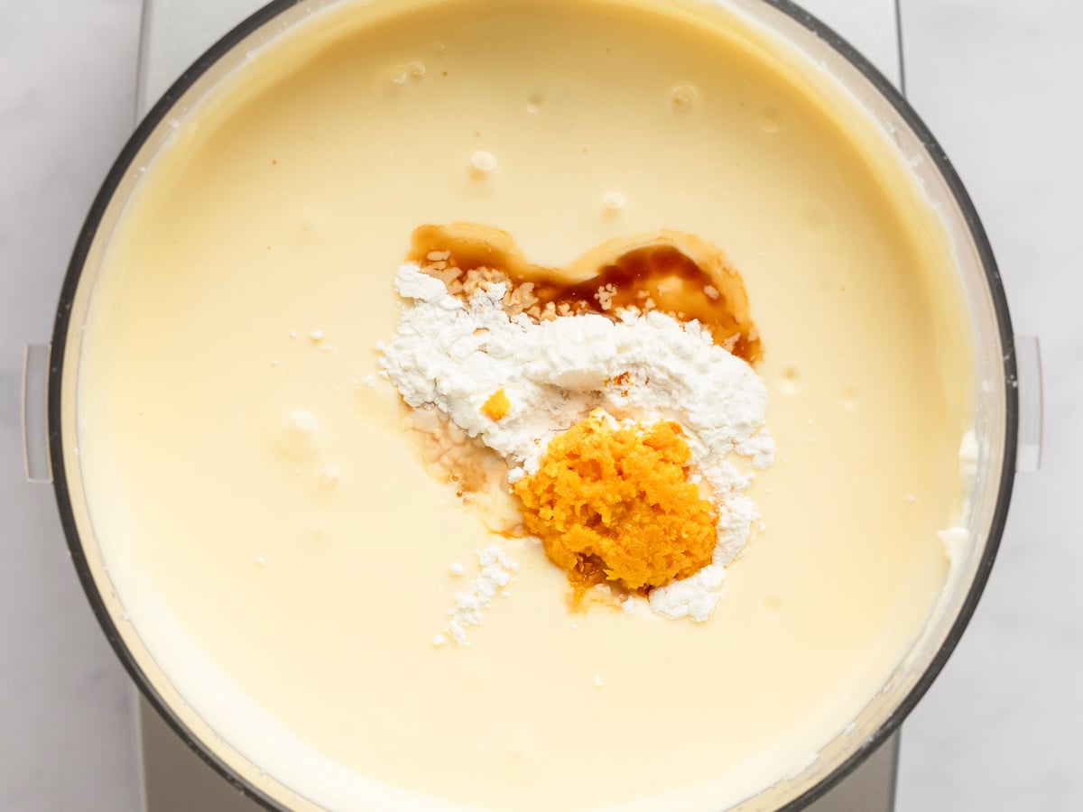 cornstarch, vanilla, amaretto and orange zest added to ricotta cheesecake filling