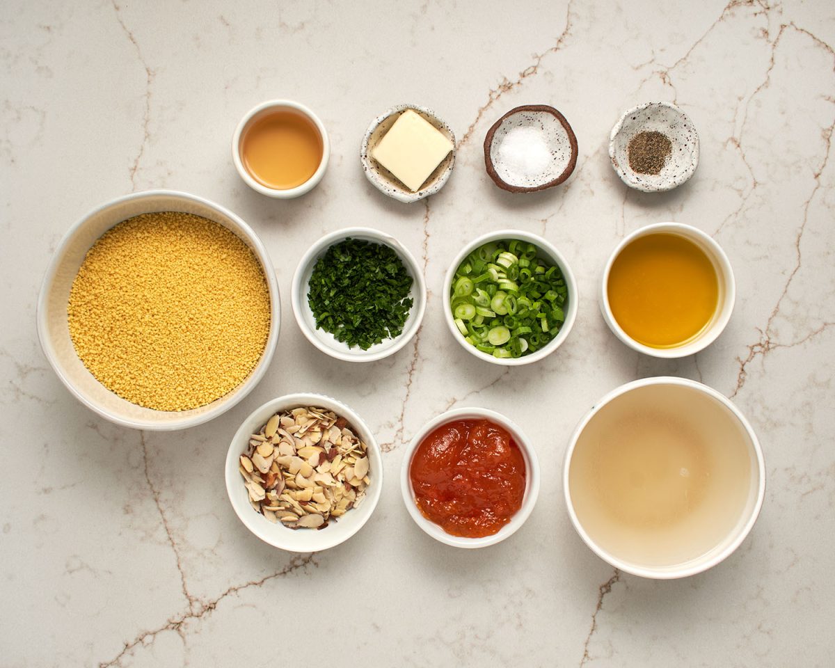 ingredients for warm couscous salad with apricot vinaigrette