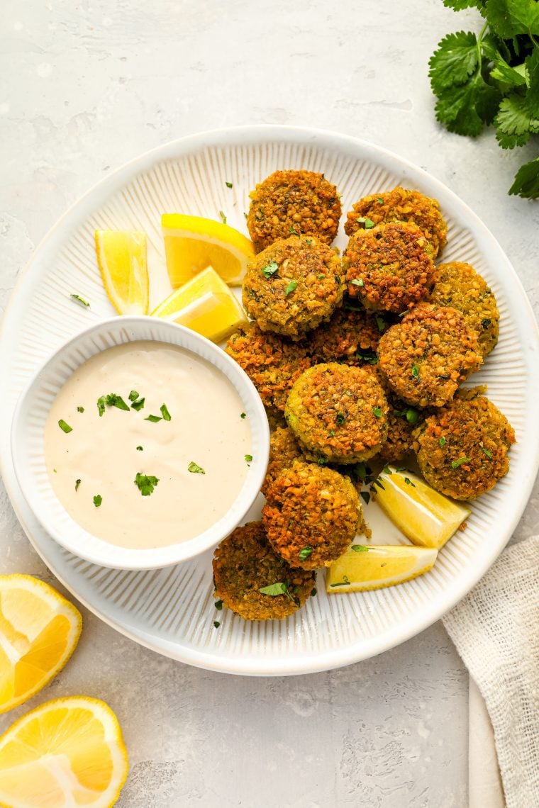 falafel on platter with tahini sauce
