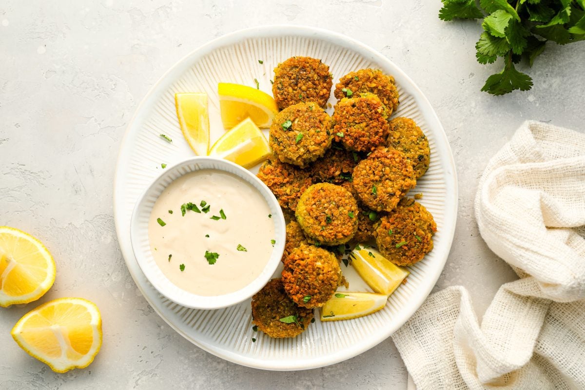 falafel on platter with tahini sauce