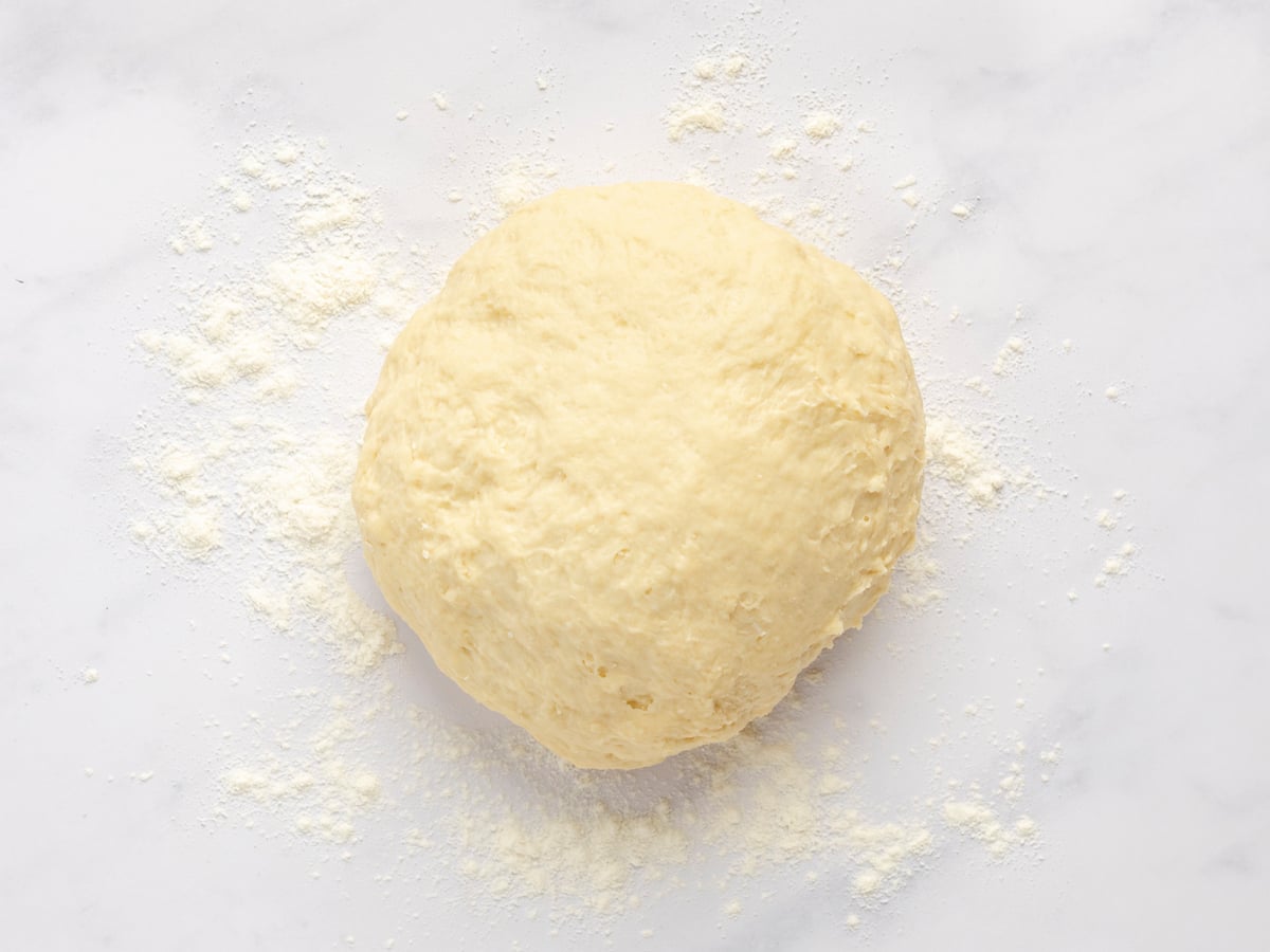 ball of dough on clean work surface
