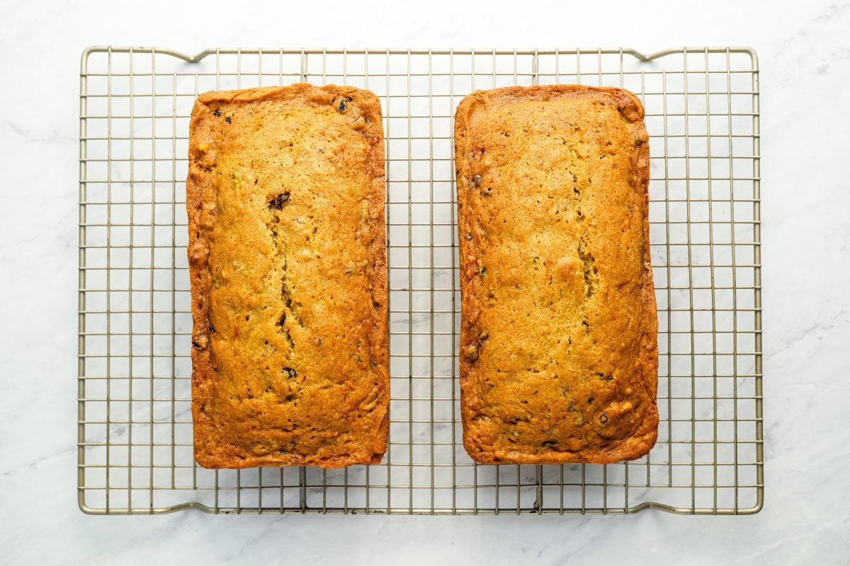 zucchini bread loaves cooling on rack