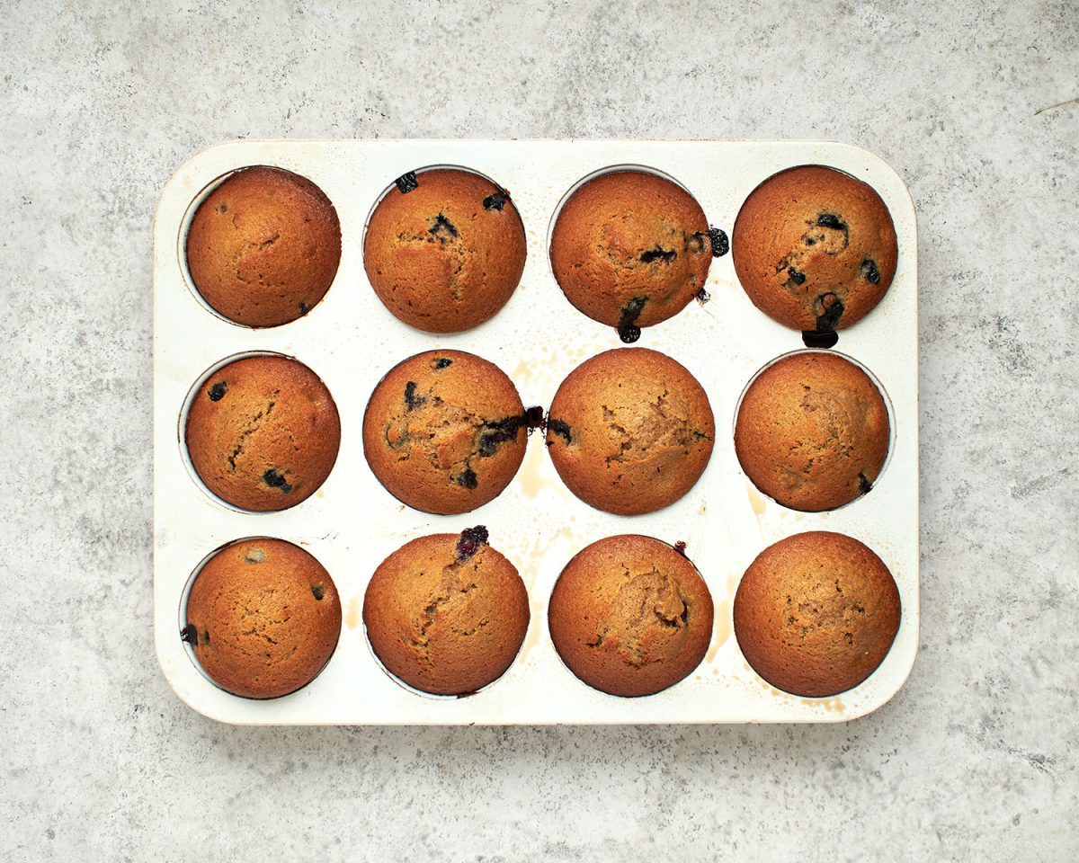 12 baked muffins in muffin tin