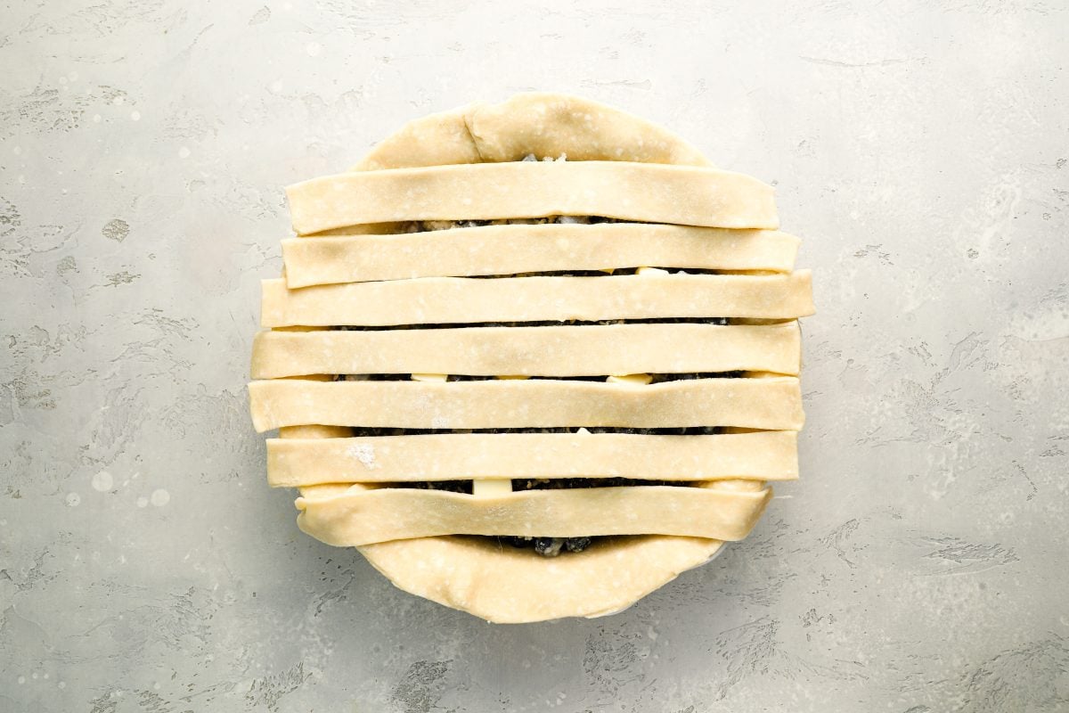 7 strips laid horizontally over pie filling