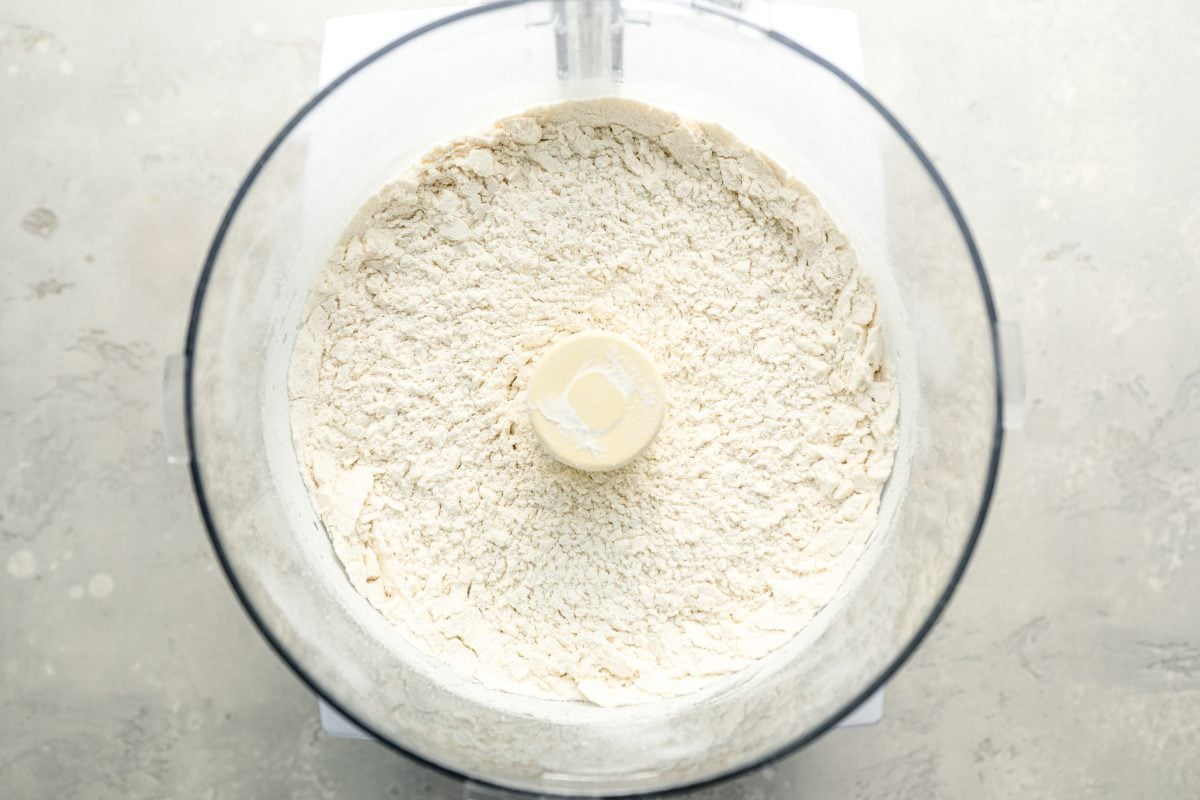 flour, sugar, salt, and baking powder combined in bowl of food processor