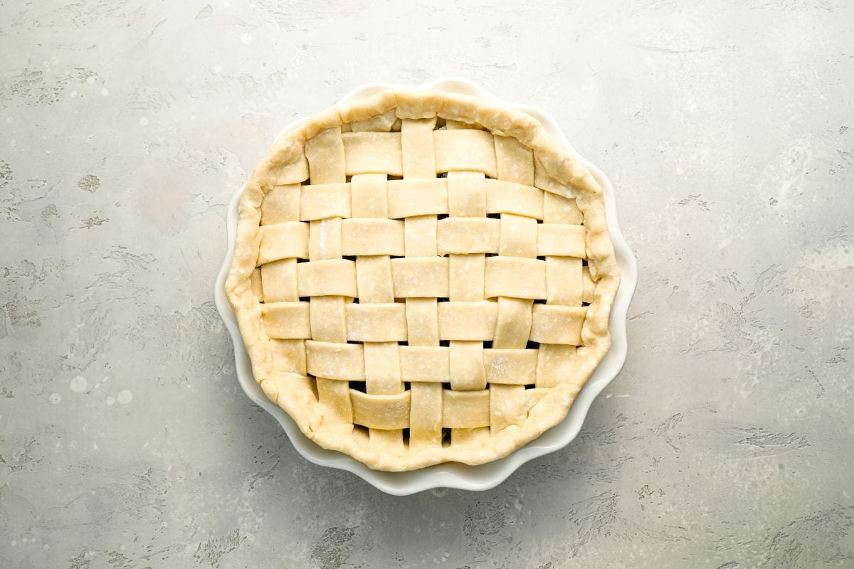 excess dough trimmed from lattice strips; edges of bottom crust folded over strips