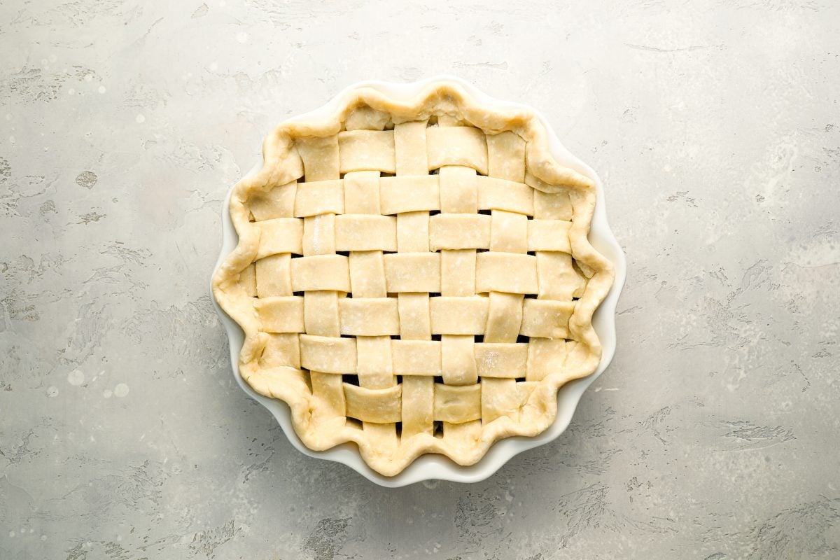 assembled blueberry pie with crimped edges