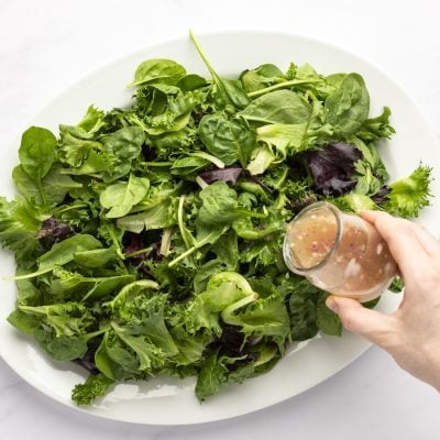 dressing the salad