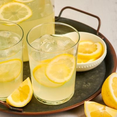 glasses and pitcher of homemade lemonade on tray