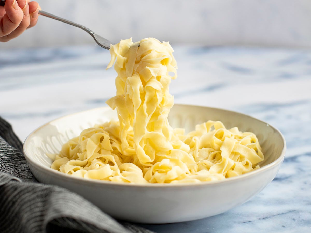 homemade pasta in serving bowl.