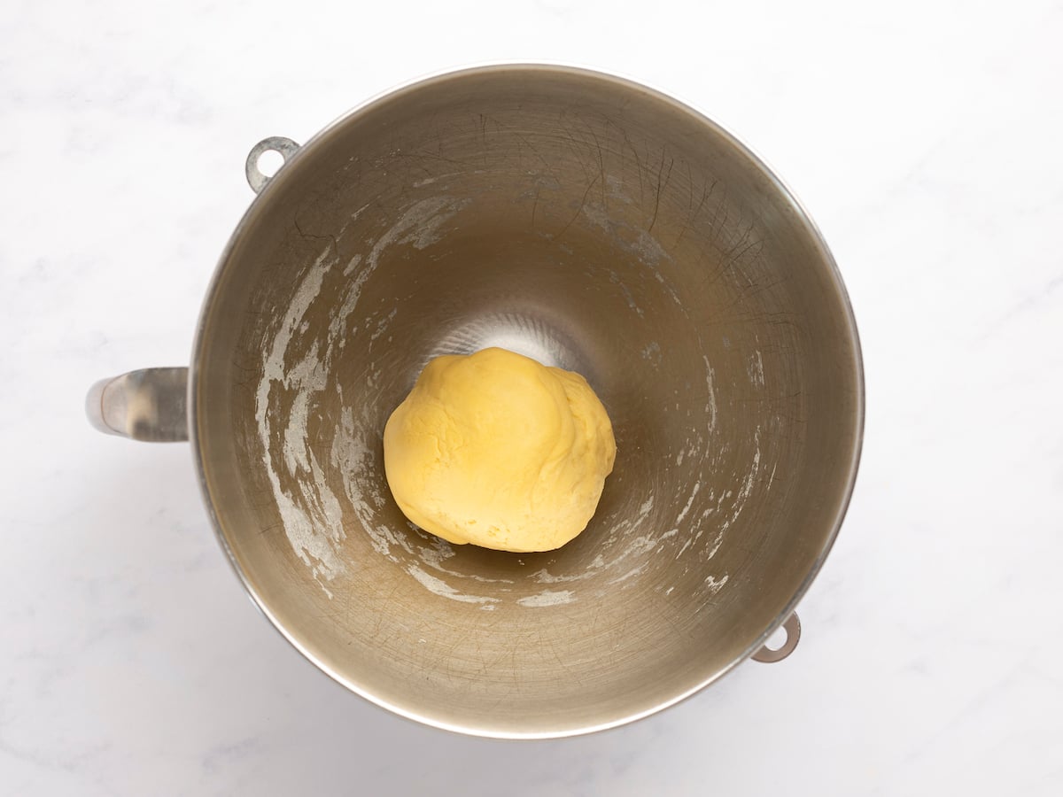 mixing bowl with ball of pasta dough