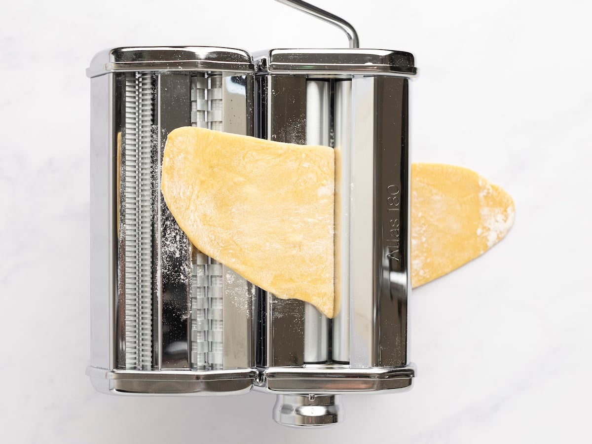 pasta dough in pasta machine