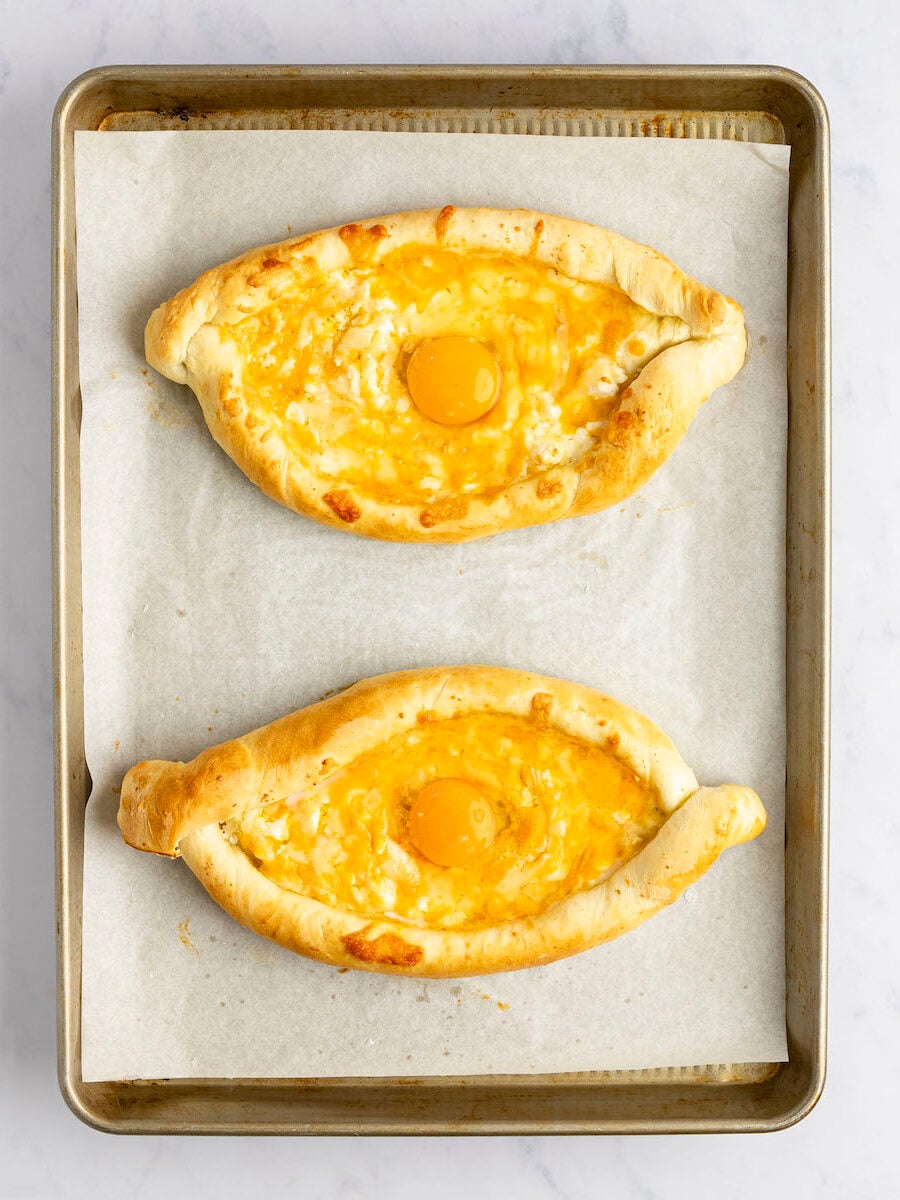raw egg in center of each khachpuri