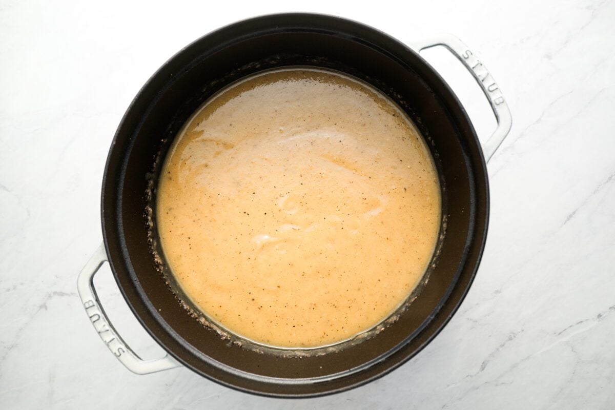 cooked potato soup ingredients blended in dutch oven