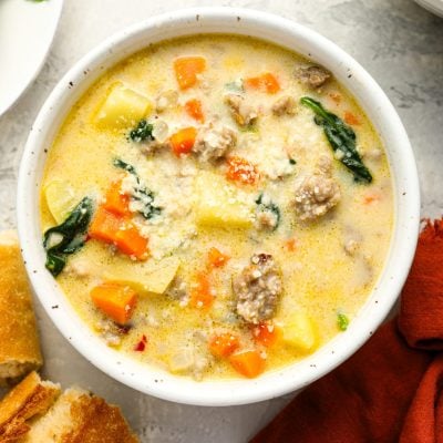 bowl of zuppa toscana with bread