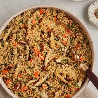 quinoa pilaf with carrots and shiitake mushrooms in bowl