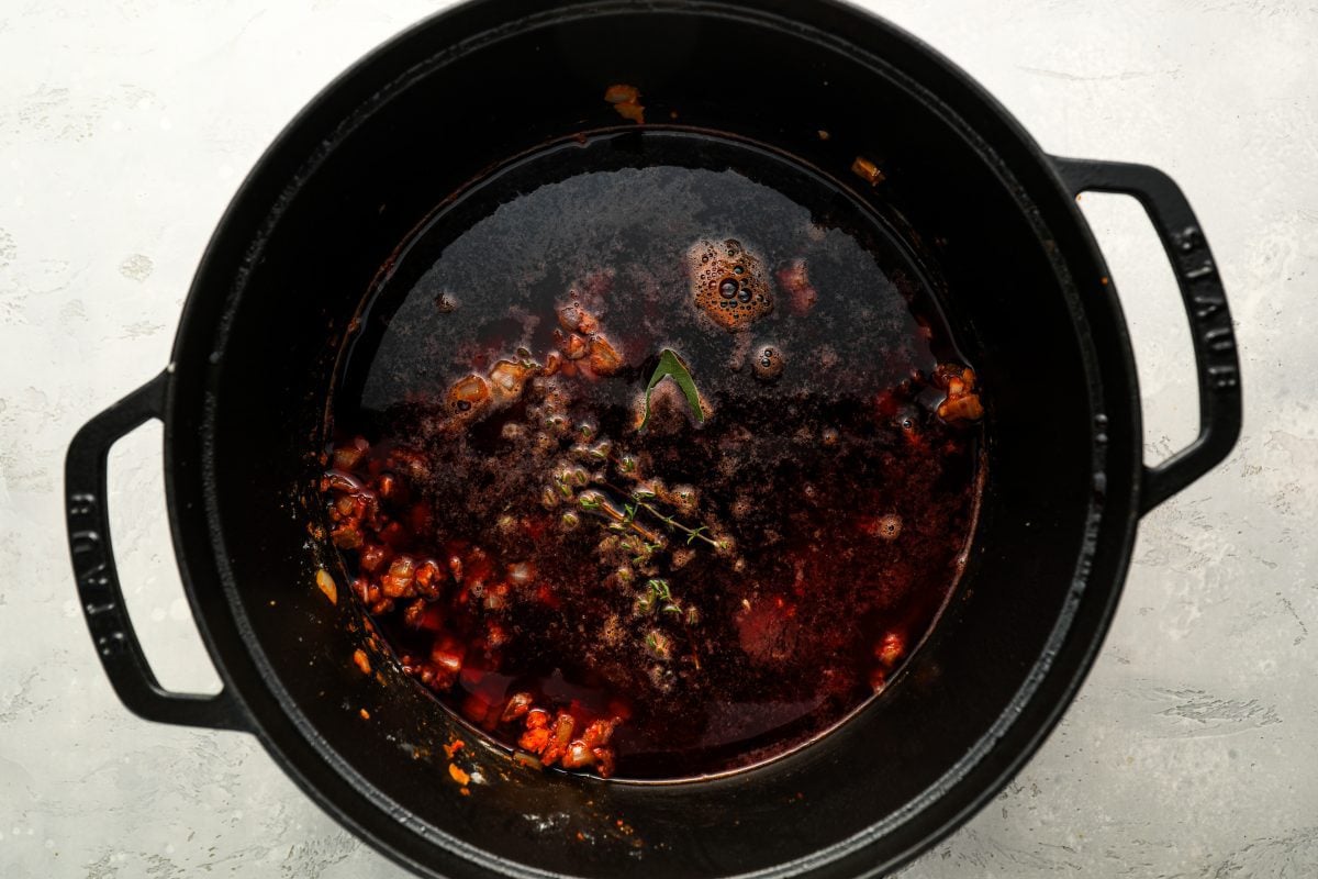 Sauce simmering in Dutch oven.