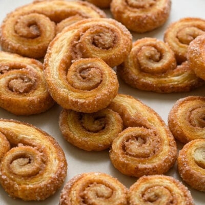 Palmiers on a white serving plate.