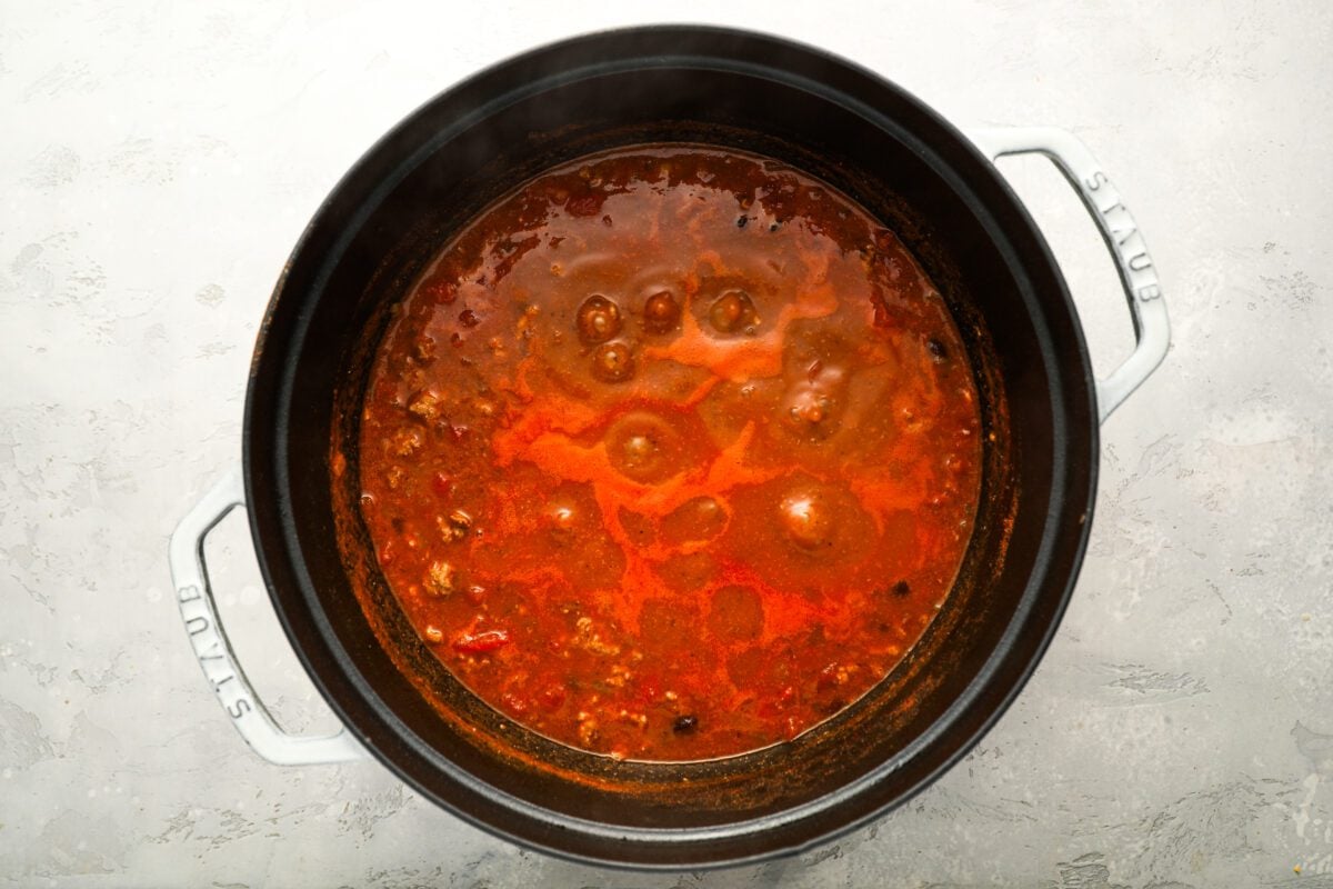 tomato/bean mixture, remaining tomatoes, beans, and broth added to dutch oven