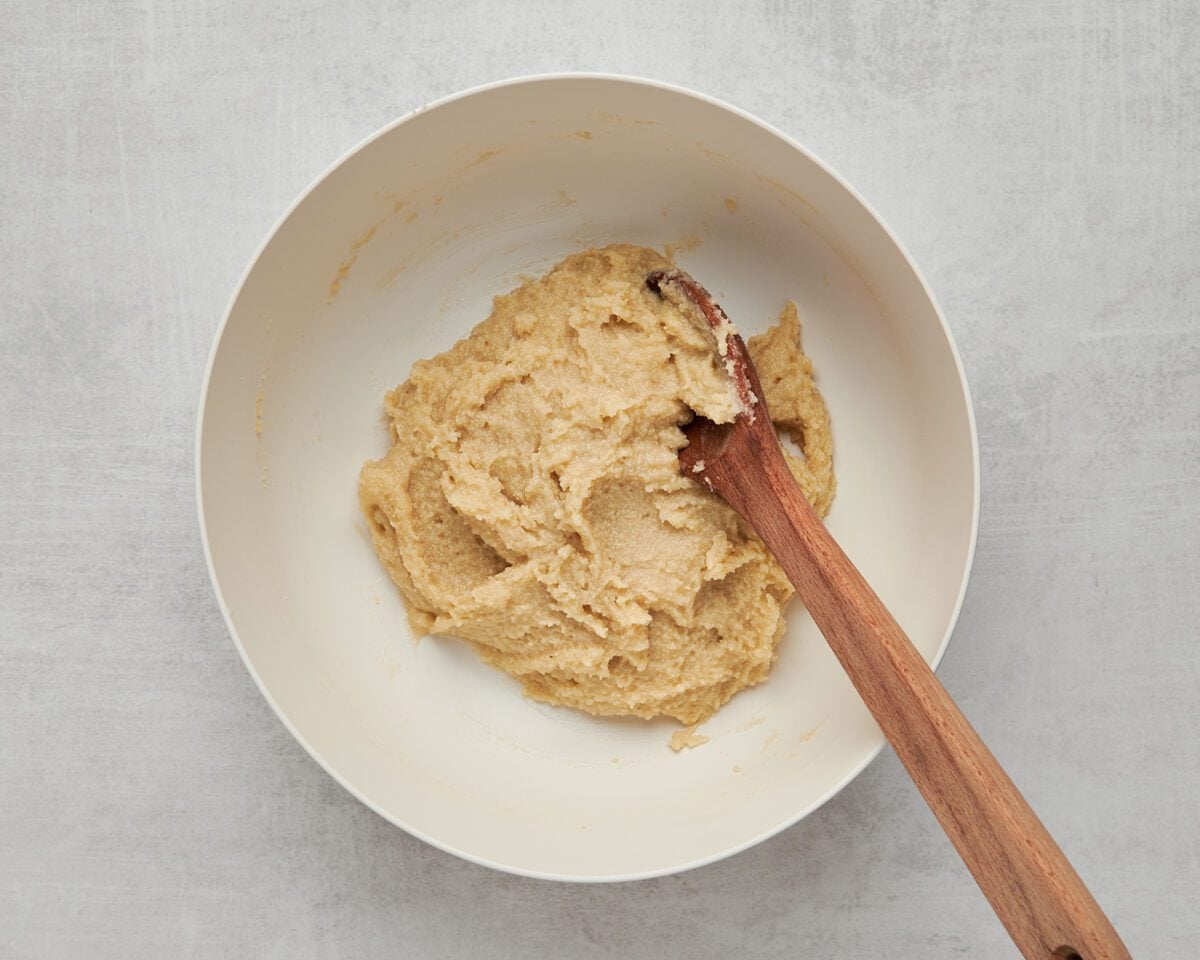 almond coookie dough in white bowl