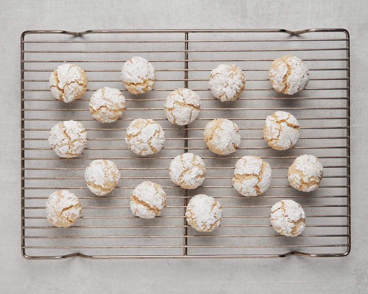 baked almond cookies on wire cooling rack