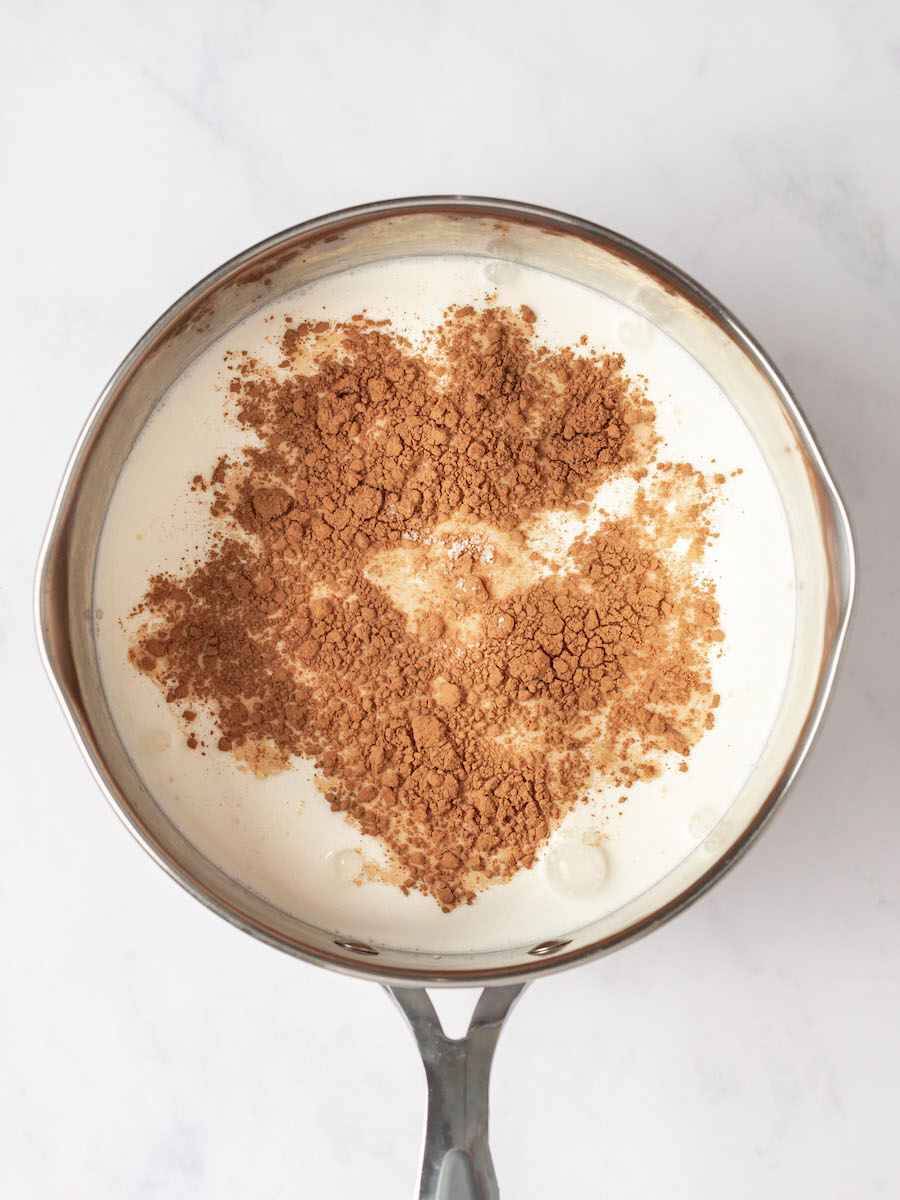 Milk and cream mixture with addition of brown sugar, cocoa powder, and salt.