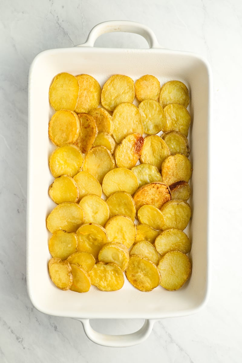 potatoes arranged in baking dish