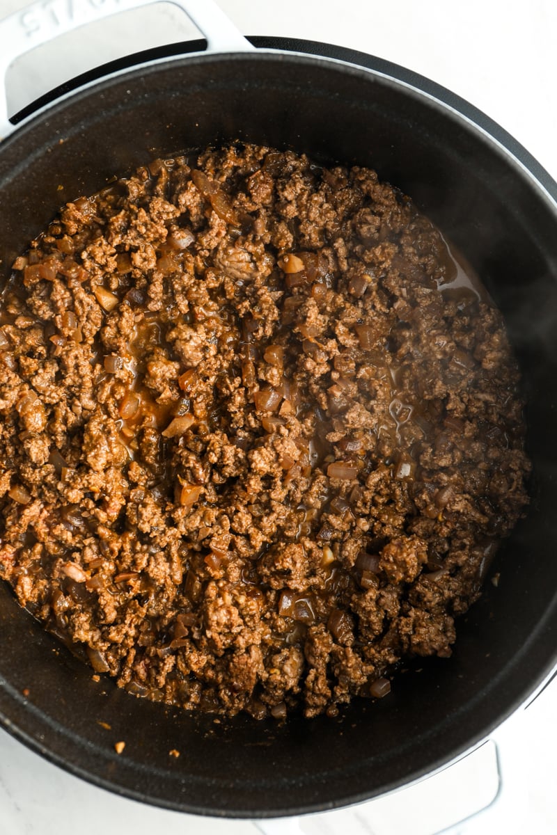 browned beef in Dutch oven