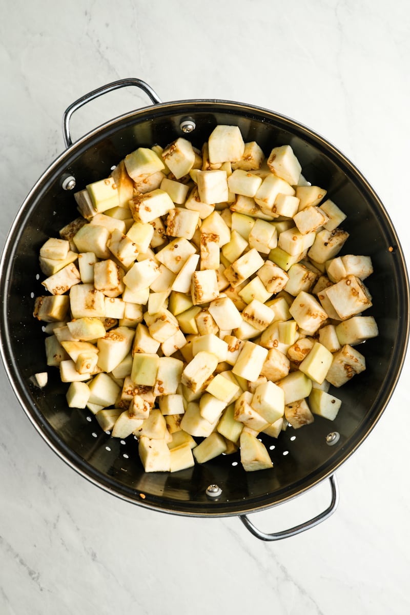 eggplant cubes in colander