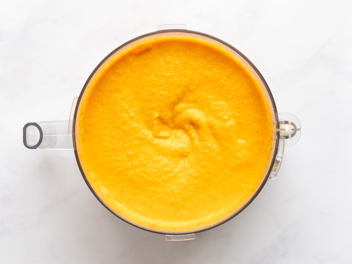 carrot/butter mixture blended with salt, cayenne, milk, brown sugar, bread crumbs, baking powder, ginger, cinnamon, and eggs