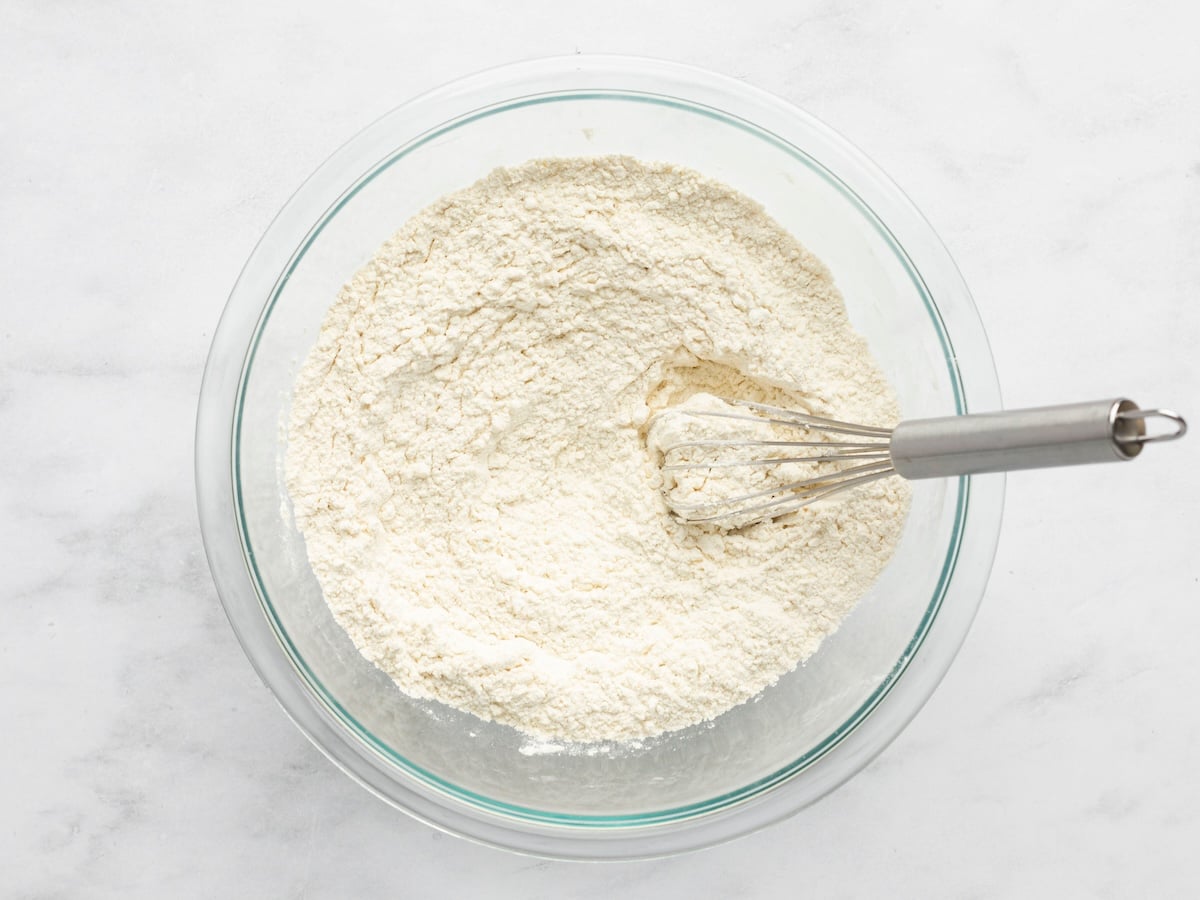 whisking flour, cornstarch, salt, and baking soda in medium bowl
