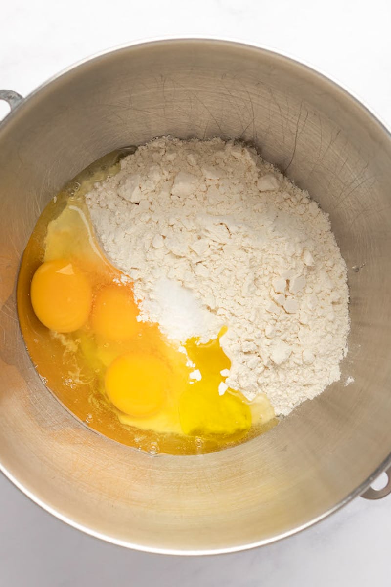 flour, eggs, oil, and salt in bowl of stand mixer.