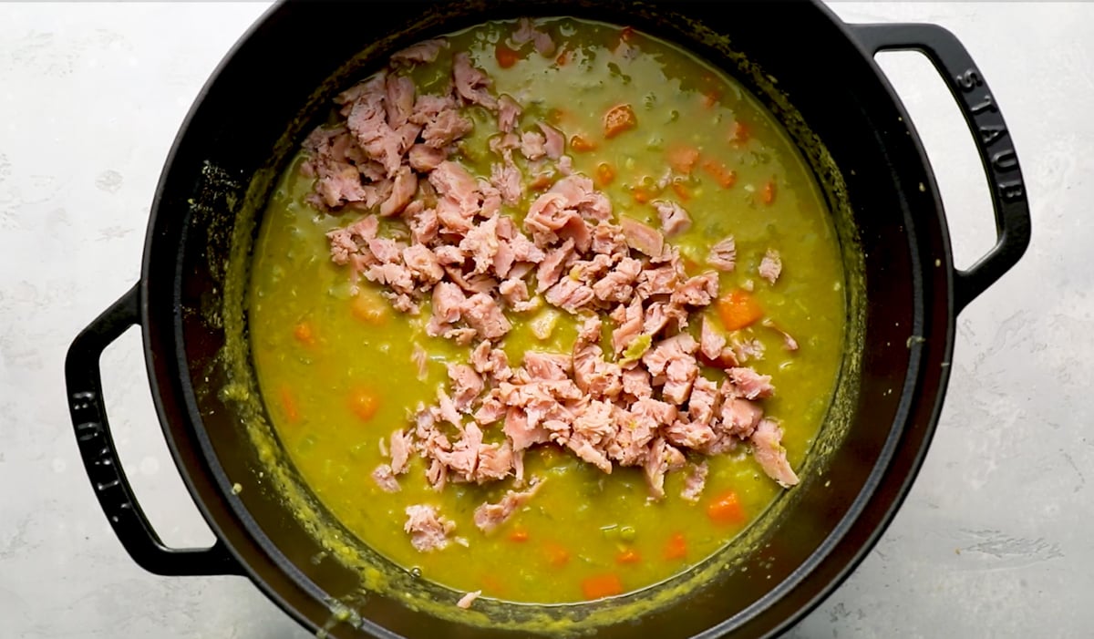 Shredded ham added to split pea soup.