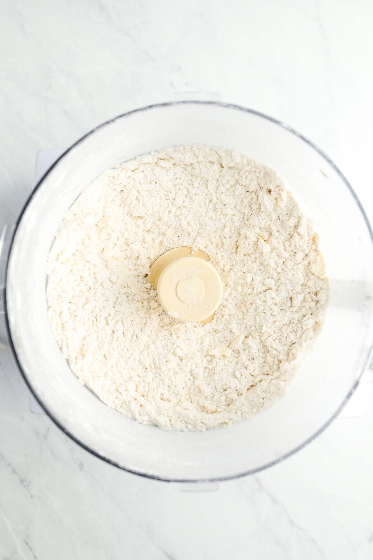Blended flour and butter mixture in food processor.