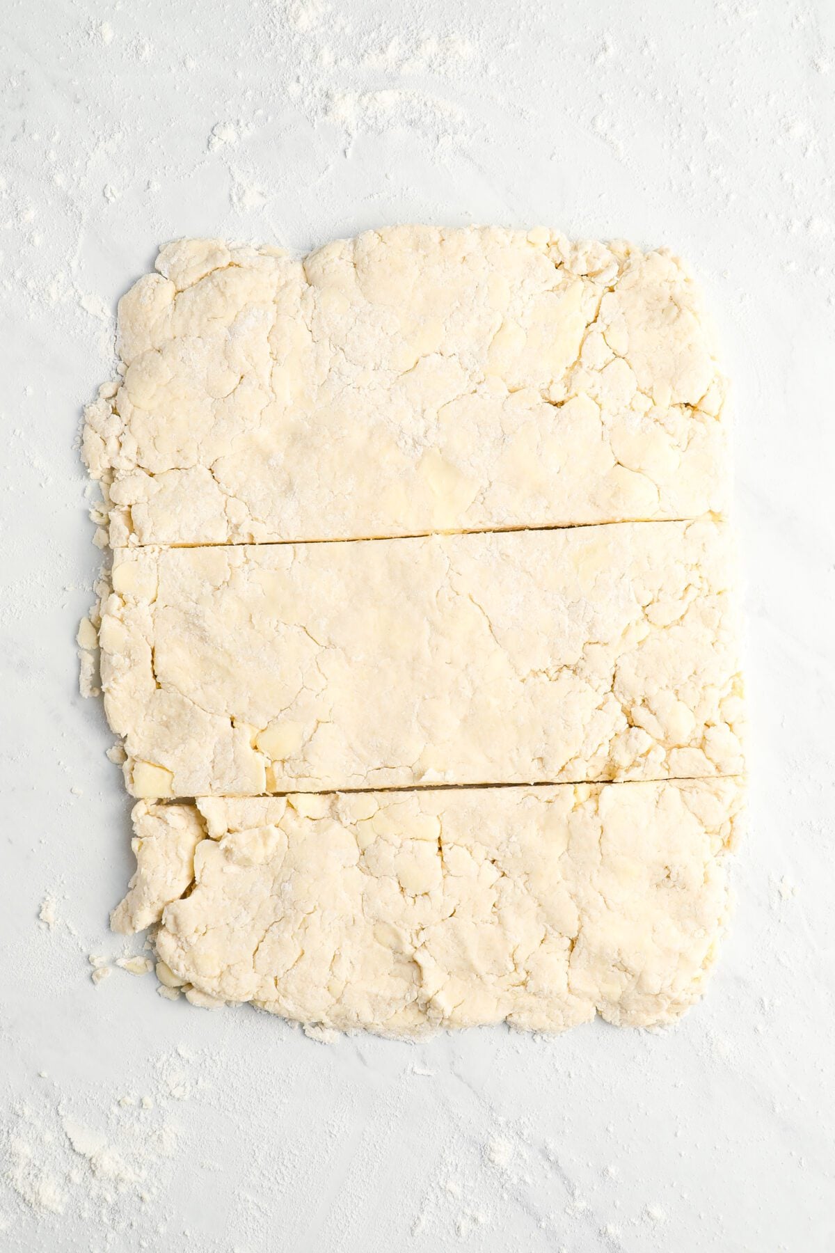 dough rectangle cut into thirds